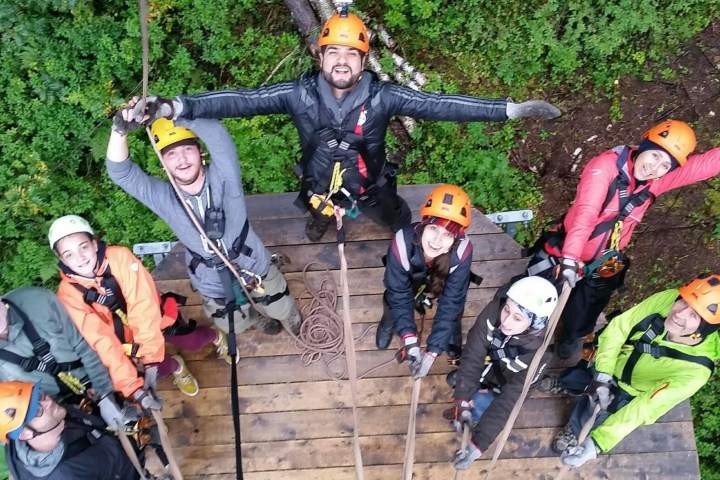 Zipline group smiling to camera